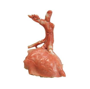 Chinese Hand Carved Coral Miniature Figure, graceful woman holding flower: Chinese Hand Carved Coral Miniature Figure, graceful woman holding flower, standing on what appears to be water lily pads. A piece of coral has been attached to the reverse to act as a counter-weight