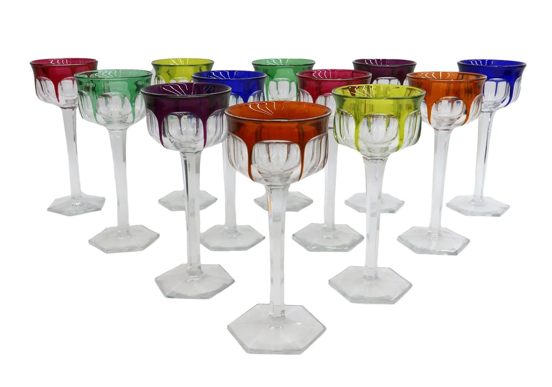 12 Baccarat France Cut Glass Colored Rhine Wine Goblets in Malmaison: 12 Baccarat France cut glass rhine wine goblets in Malmaison. Cut glass thumbprints to exterior of bowl with hexagonal base pairs of 6 different colors include chartreuse, cobalt blue, rose, emerald g