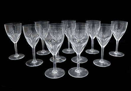 11  Baccarat France Cut Glass Tall Water Goblets in Genova Signed: 11 Baccarat France cut glass tall water goblets in Genova Signed. Thumbprint cut bowl with a size sided stem. Acid etched Baccarat mark to underside. Weight: Approx. 8 lbs Measurements: Approx. 3.25 i