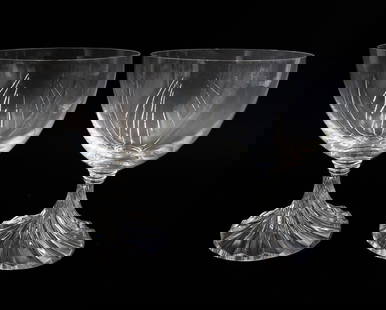 Pair Lalique France Crystal Glass Water Goblets in Rambouillet: Pair Lalique France Crystal Glass Water Goblets in Rambouillet. Clear bowl with a twisted flare stem. Signed "Lalique France" to underside. Weight: Approx. 1 lb Measurements: Approx.4.075 inches diame