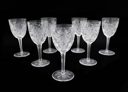 7 Baccarat France Cut Glass Claret Wine Goblets in Lagny Signed: 7 Baccarat France cut glass claret wine goblets in Lagny, Signed. Elaborate cut star designs to bowl. Acid etched Baccarat mark to base.Weight: Approx. 4 lbs Measurements: Approx. 3 inches diameter x