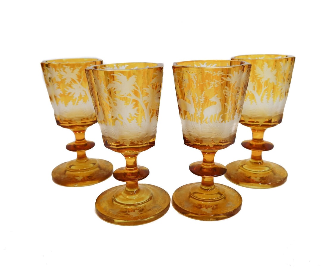 4 Bohemian Amber Cut to Clear Glass Claret Wine Goblets Fauna Scene c1900: 4 Bohemian Amber cut to clear glass claret wine goblets, circa 1900. Cut to clear fauna designs of deer in the woods. Variation to thickness due to its handmade nature. Weight Approx. 2 lbs Measuremen