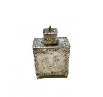 Dutch Miniature Footed 833 Silver Tea Caddy c. 1900 Repousse Scenes Figures: Dutch 833 silver miniature footed tea caddy circa 1900. Low relief repousse scenes of figures to each side, framed by scroll designs. Removable top also with repousse designs, along with a spear finia
