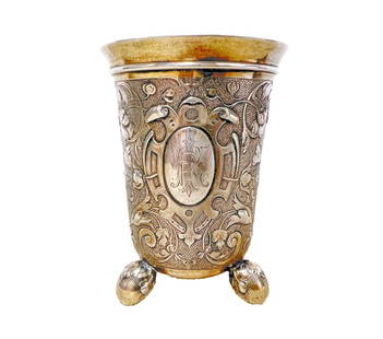 Koch and Bergfeld Parcel Gilt 800 Silver Footed Beaker Cup c1900: Koch and Bergfeld Parcel Gilt 800 Silver Footed Beaker Cup, c1900. Beautifully repousse figures, dolphins, fruit and floral designs. Monogram on cartouche 'KI', Three acorn form feet. Makers mark on b