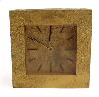 Tiffany & Co Square Rockwork Gilt Bronze Desk Clock Swiss Made 15 Jewels: Tiffany & Co Square Rockwork gilt bronze desk clock. Irregular textured to exterior resembling natural rock formations. Marked Tiffany & Co. to face. Back marked Swiss / Swiss Lever Escapement c.244 /