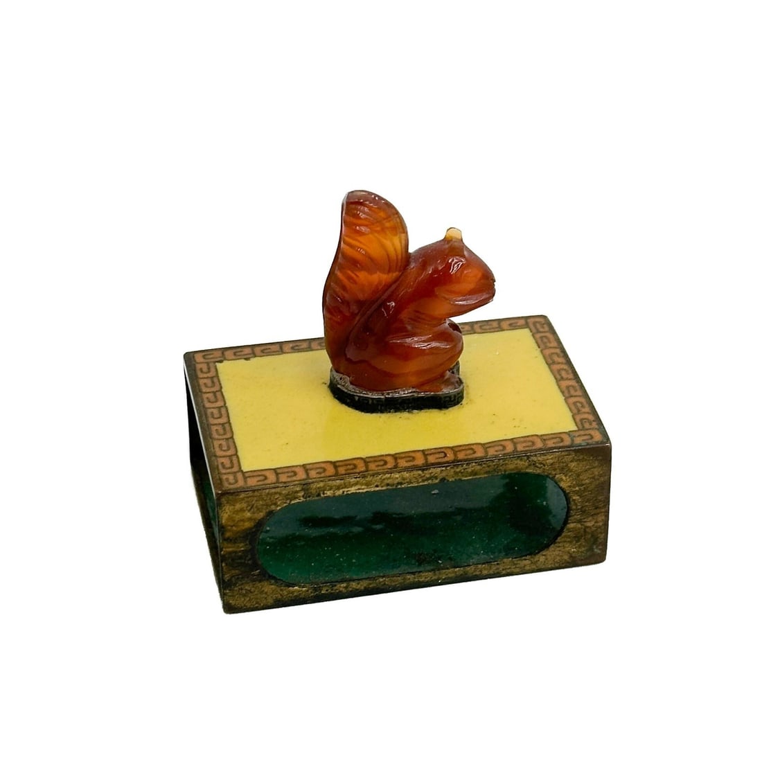 Japanese Cloisonne Enamel Matchbox Holder Carnelian Squirrel: Japanese Cloisonne Enamel Matchbox Holder. Yellow enamel with metal mounts, carved carnelian squirrel to top Weight: Approx. .5 lb Measurements: Approx. 2.375 inches x 1.625 inches x 2.375 inches tall