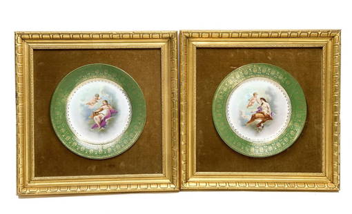 Pair Royal Vienna Porcelain Cabinet Plates, Framed. Cherubs and Beauties: Pair Royal Vienna porcelain cabinet plates. The center of the plates depict beauties and putti/cherubs in the clouds. Artist signed "Cloris" and "Aglaia" to the lower edge. A green ground to the rim w