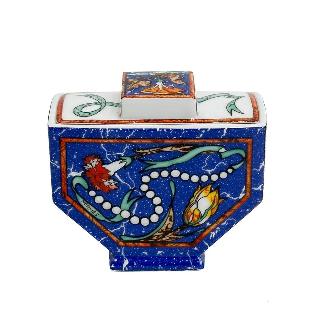Hermes Limoges France Porcelain Lidded Sugar in Marqueterie: Hermes Limoges France Porcelain Lidded Sugar in Marqueterie. A blue ground decorated with fruits, fans, and pearls. Underside marked Hermes Porcelaine Limoges France Marqueterie de Pierres d'Orient et