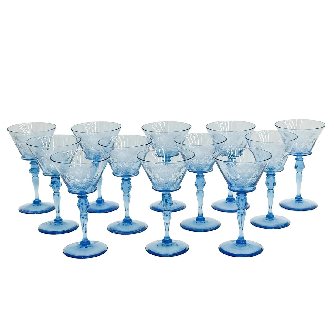 12 Steuben Glass Marina Blue Engraved Autumn Wine Glasses Prunts Signed: 12 Steuben Marina Blue Engraved Wine Glasses. Marina blue glasses engraved in the Autumn pattern to the bowl, prunts to the stems. Each with acid-stamped Steuben mark to the underside, though many mar