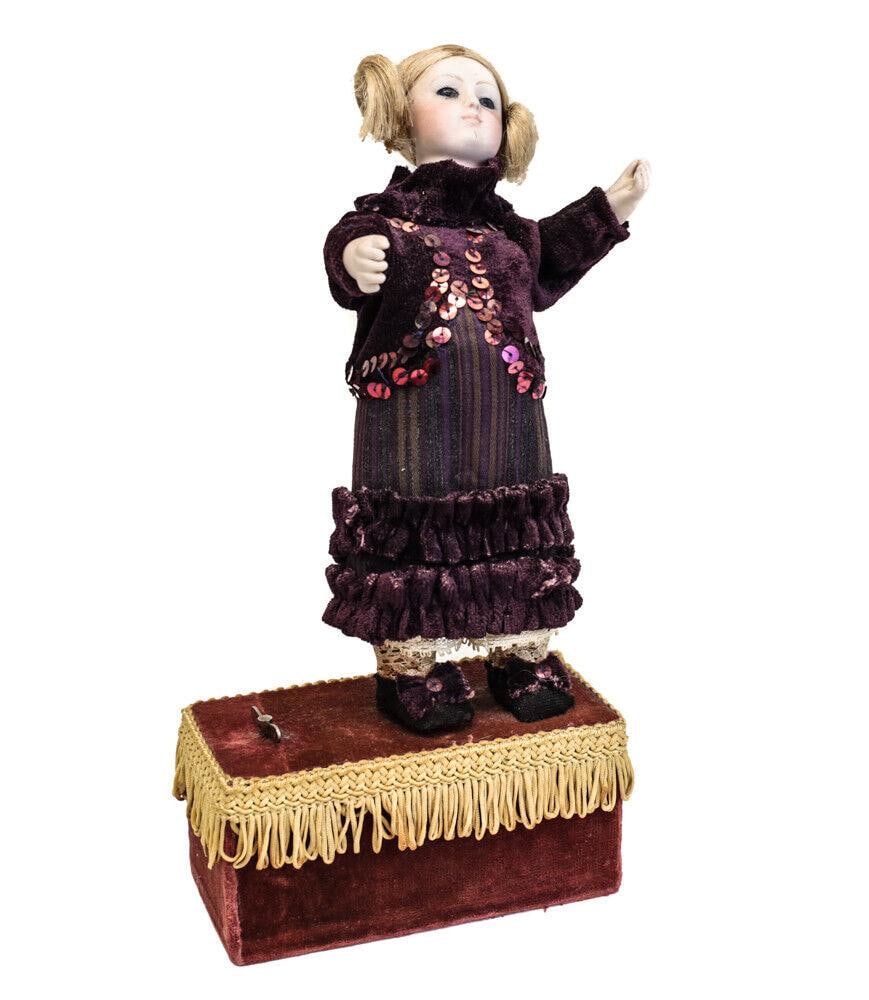 19th Century Wind Up Automaton Doll, Continental, moves arms, head and body: 19th century Wind Up Automaton Doll, Continental, moves arms, head and slight movements to body Bisque head, hands. 1.25lbs Measurements: Approx. total height 11.75"; doll is 8.75" Condition: Working