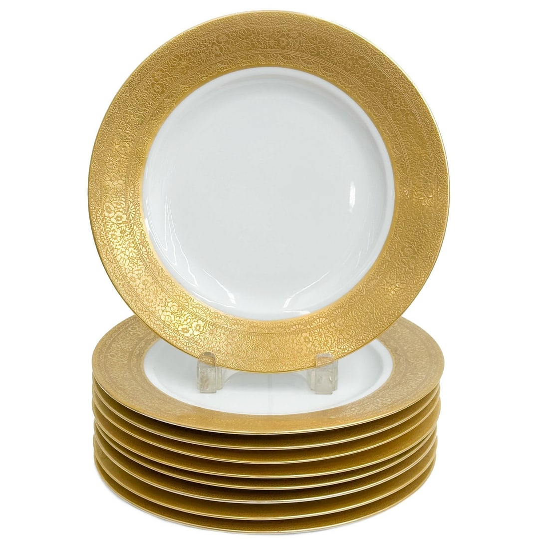 9 Royal Hutschenreuther Selb Bavaria Gilt Porcelain Dinner Plates circa 1930: 9 Royal Hutschenreuther Selb Bavaria Gilt Porcelain Dinner Plates. Ornate floral gilt edge. Underside marked Royal Hutschenreuther Selb Bavaria, impressed 26 Weight: Approx. 10.5 lbs Measurements: App