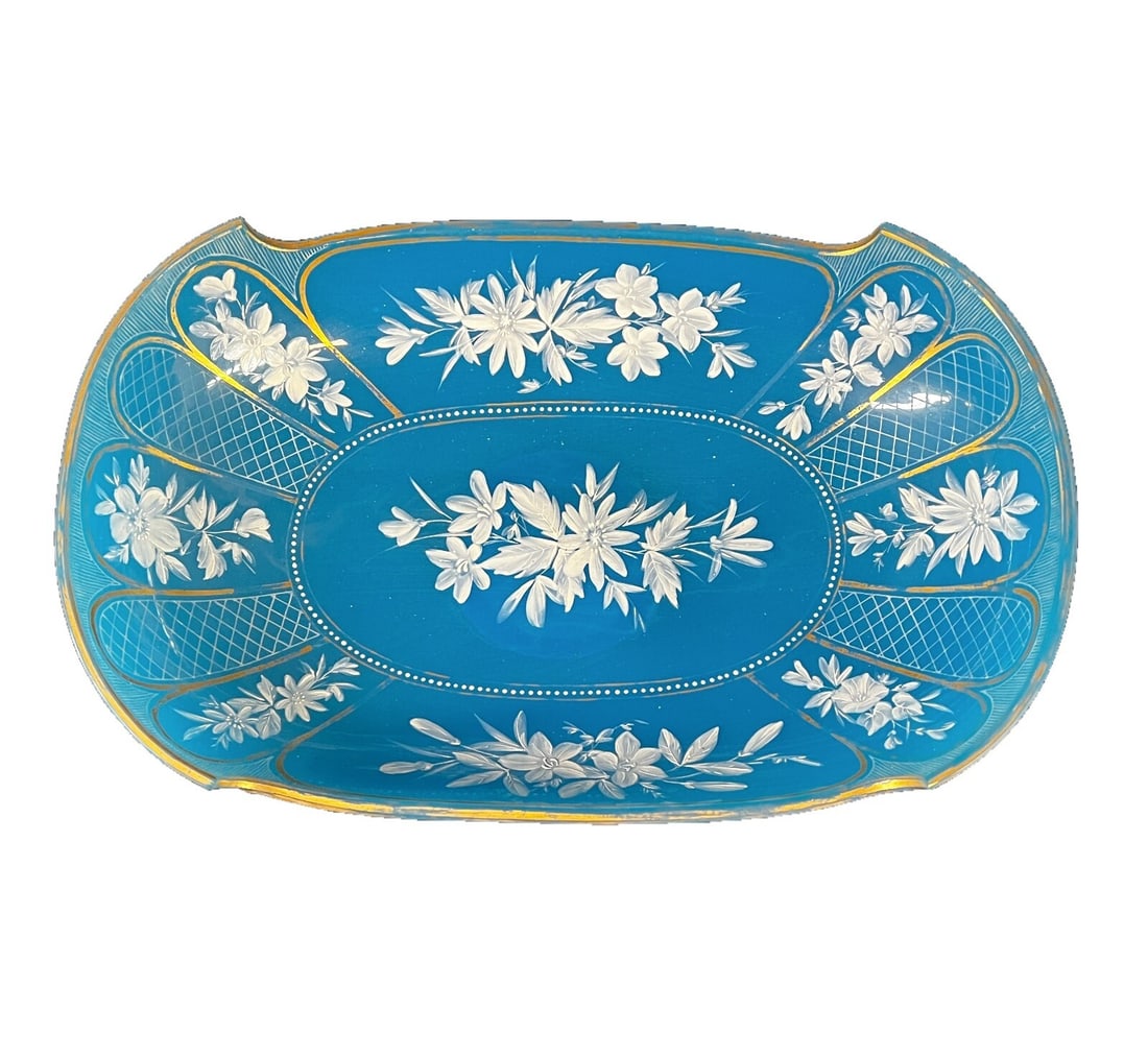 French blue opaline glass centerpiece bowl floral enamels: French blue opaline glass centerpiece bowl with hand painted white enamel florals and gilt. Raised enamel beads. 2.25lbs Measurements: Approx. 12.625 x 7.25 x 2.875 inchesCondition: Very good conditio