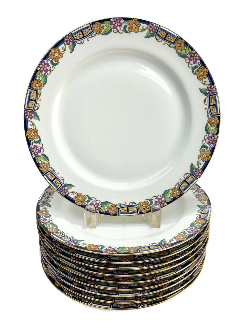 10 Jean Pouyat Limoges France Porcelain 9.75 inch Dinner Plates, circa 1900: 10 Jean Pouyat Limoges France porcelain 9.75 dinner plates, circa 1900. Multi-colored flowers to the rim. Marked Jean Pouyat Limoges to the underside. Weight: Approx. 8 lbs Measurements: Approx. 9.75