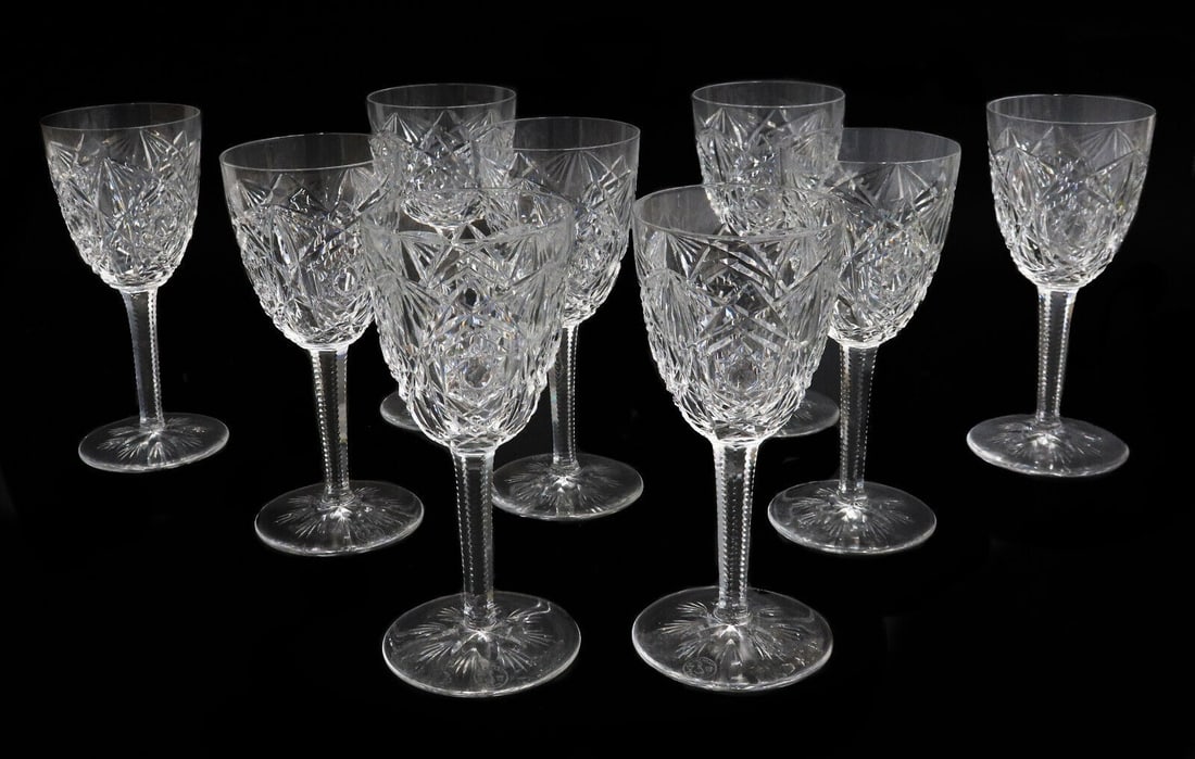9 Baccarat France Cut Glass Port Wine Goblets in Lagny, Signed: 9 Baccarat France cut glass port wine goblets in Lagny, Signed. Elaborate cut star designs to bowl. Acid etched Baccarat mark to base. Weight: Approx. 3 lbs Measurements: Approx. 2.5 inches diameter x