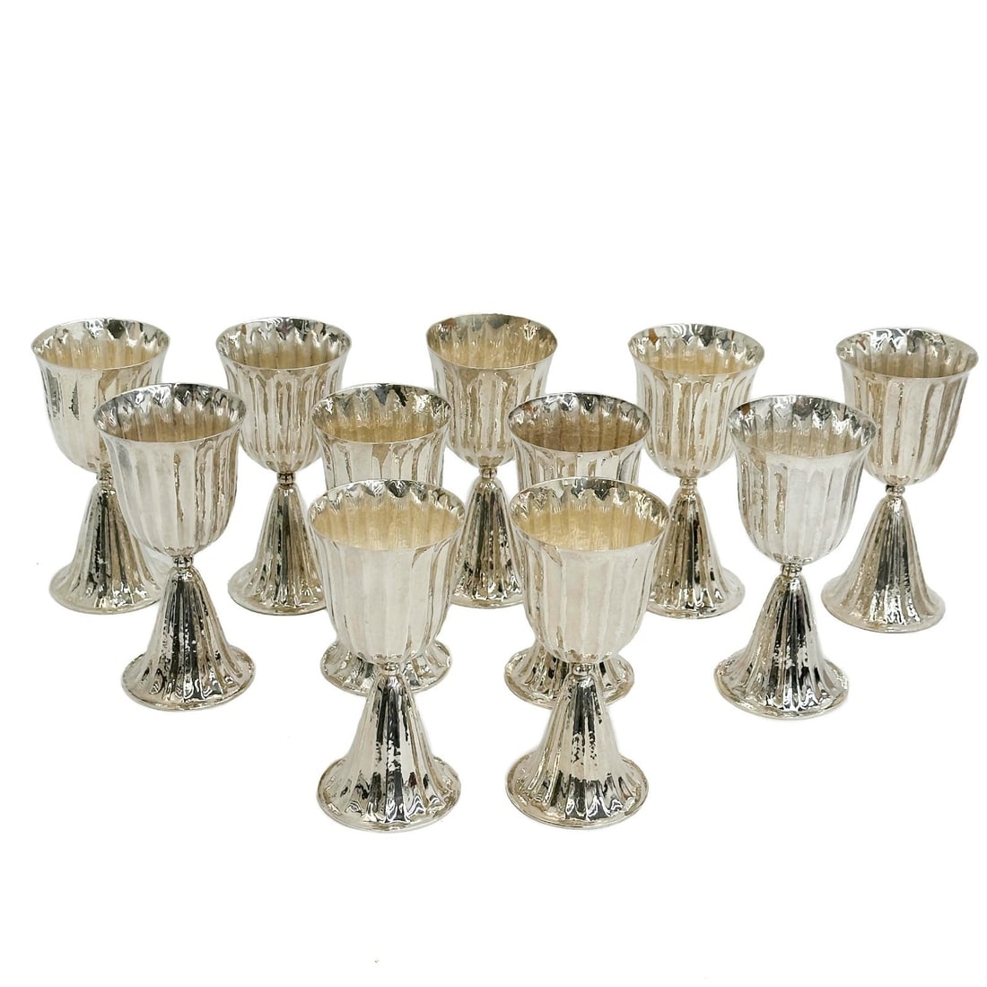 11 Buccellati Italy Sterling Silver Hand Hammered Goblets c1960: 11 Buccellati Italy Sterling Silver Hand Hammered Goblets, circa 1960. Underside of foot rim marked Italy Buccellati Sterling. Weight: Approx. 57.5 ozt Measurements: Approx. 3.125 inches diameter x 6.