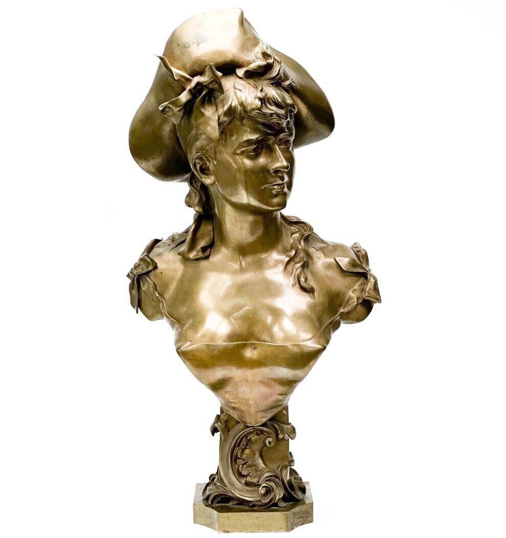 Anton Nelson Austrian Gilt Bronze Portrait Bust Floreal for Tiffany & Co c. 1900: Anton Nelson (Austrian, ac. 1880-1910) gilt bronze portrait bust, "Floreal" retailed by Tiffany & Co, circa 1900. Gilt bronze portrait bust of a woman wearing a hat, foliate decoration to the base. Si