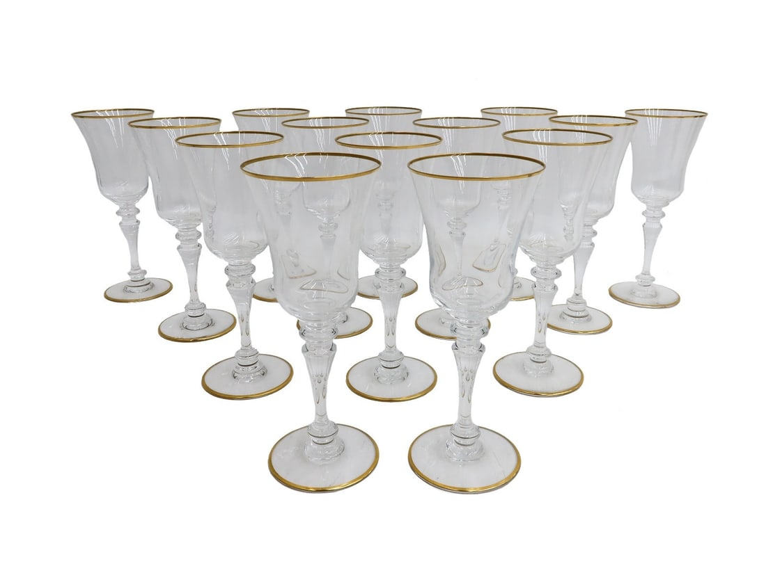 14 Baccarat France Crystal Glass Claret Wine Goblets in Vienne Signed: 14 Baccarat France Crystal Glass Claret Wine Goblets in Vienne Signed. Gold trim to rim. Baccarat mark to underside. Weight: Approx. 8 lbs Measurements: Approx. 2.875 inches diameter x 7.325 inches ta
