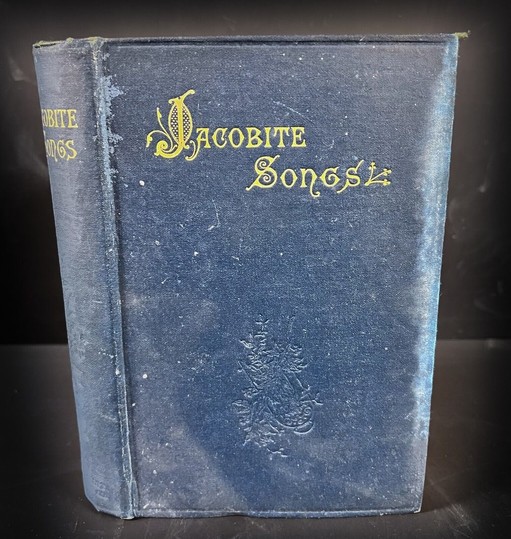 Gilbert MacQuoid, Jacobite Songs & Ballads 1890: Gilbert MacQuoid ed, Jacobite Songs & Ballads (Selected), Blue cloth boards with gilt title and blind stamped embellishments. Published Walter Scott Publishing London 1890. Measurements: Approx. 5.25