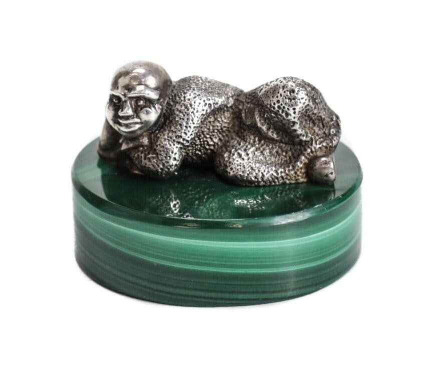Sterling Silver miniature Reclining Monk figure on Malachite base: Whimsical Sterling Silver Miniature Reclining Figure on Malachite, marked .925. Amusing character in long gown, head propped with arm. 84.2grams Measurements: Approx. Total height 1.125", base 1.5" di