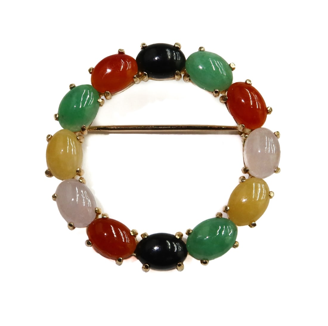 Gump's 14k Yellow Gold Multi-Colored Cabochon Jade Pin Brooch: Gump's 14k yellow gold multi-colored cabochon jade pin brooch. Each cabochon jades measuring approximately 7.1mm x 5mm x 2.3mm and includes green, yellow, red, white, and black jade. Marked Gump's 14k