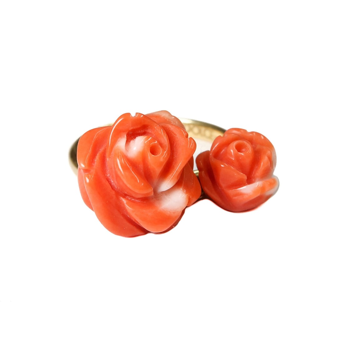 Dolce and Gabbana 18k Yellow Gold Carved Coral Roses Ring Size 6.75: Dolce and Gabbana 18k yellow gold carved coral roses ring, Size 6.75. Two carved coral rose charms. Marked "Dolce & Gabbana" to interior band along with Italian 18k gold marks. Weight: Approx. 4.97 gr