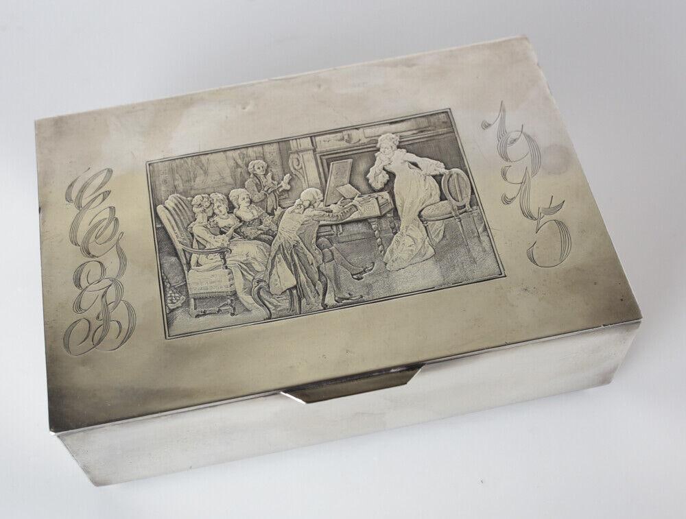 Antique Silverplate Meriden B. Company Rogers Bros Box hand chased scene c1915: Antique Silverplate Meriden B. Company, Rogers Bros Box, c early 20th century, hand chased scene of 18th century figures. Monogrammed "EGB" and "1915". Wood lined. 2.25lb Measurements: Approx. 8.125"