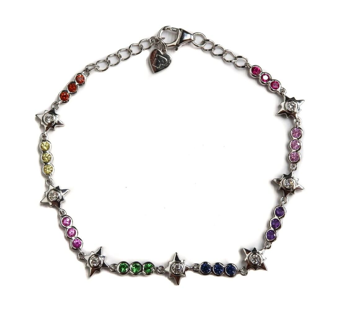 Eden Presley 14k White Gold Diamond Multi Colored Sapphire Stars Bracelet: Eden Presley 14k White Gold Rainbow Stars Necklace. 7 round cut diamonds to the center of the star spacers weighing approximately 0.21 carats. Various multi-colored orange, yellow, pink green, blue, p