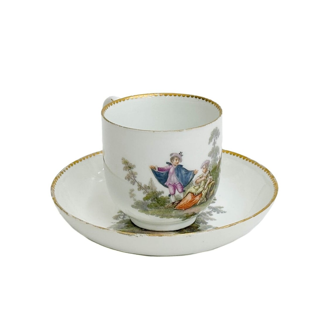 Meissen Germany Watteaumalerie Courting Scene Porcelain Cup and Saucer c 1760: Meissen Germany Hand Painted Watteaumalerie Porcelain Cup and Saucer, circa 1760. Hand painted courting scenes with figures to the cup and saucer. Underside of each with Meissen crossed swords mark We