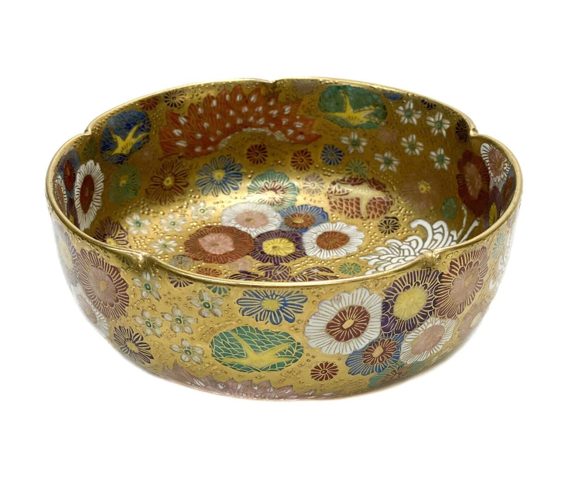 Japanese Mille Fleur Satsuma Hand Painted Enamel Scallop Rimmed Bowl: Japanese Mille Fleur Satsuma hand painted enamel scallop rimmed bowl. Beautiful multi-colored flowers throughout with rich gilt accents. Japanese Satsuma mark to the underside base. Weight: Approx. 1