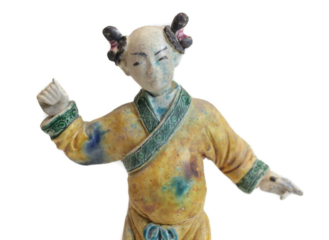 19th c Chinese Polychrome Stucco Roof Figure Youthful character, in yellow robe: 19th century Chinese Polychrome Stucco Glazed Roof Figure, Youthful character, in yellow robe with green trim, two side buns. Hand clenched as if holding something. On metal and acrylic mount. 1.5Lbs