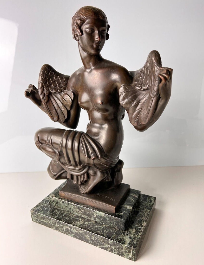 John Gregory England 1879-1958 Patinated Bronze Sculpture Philomena: John Gregory (England 1879-1958) Patinated Bronze Sculpture Philomena. Art Deco bronze on stepped stone base. Titled on bronze, "Philomena," which features an winged nude female figure kneeling. Stamp