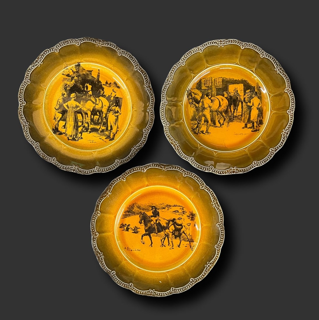 3pc Ridgways Coaching Days Brown Glazed Earthenware Pottery Plates: a 3pc set of Ridgways Coaching Days Brown Glazed Earthenware Pottery Plates with scalloped rims and raised design. 2.5lbs Measurements: Approx. 8.75 inches diameter Condition: Good condition, crazing,