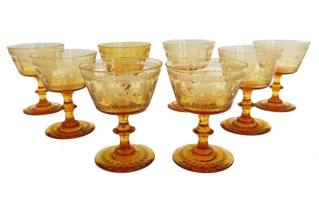 8 Steuben Amber Art Glass Etched 4.5 inch Wine Goblets 1st Half 20th Century: 8 Steuben Amber Art Glass Etched 4.5 inch Wine Goblets 1st Half 20th Century. Etched leaves and and flowers to exterior of the bowls with a circular garland to base. Pontil underside. Unmarked, work o
