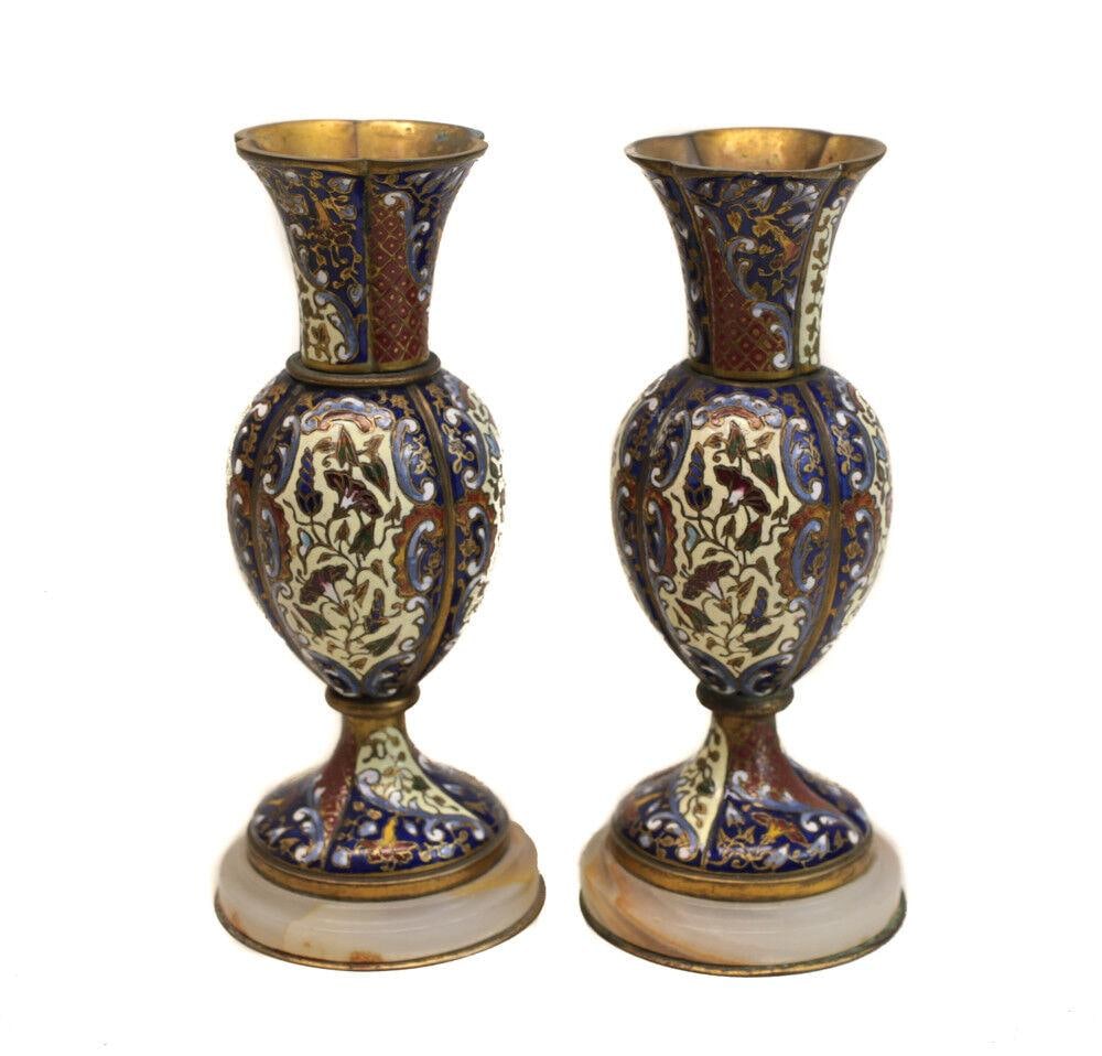 Pair of French Gilt Bronze Champleve Shaded Enamel Vases 19th century: Pair of French Gilt Bronze Champleve Shaded Enamel Vases 19th century, with alabaster bases. Colors of deep blue, rust, cream, red, green. Lobed form. 2.25lbs Measurements: Approx. 6" height x 2.5" di