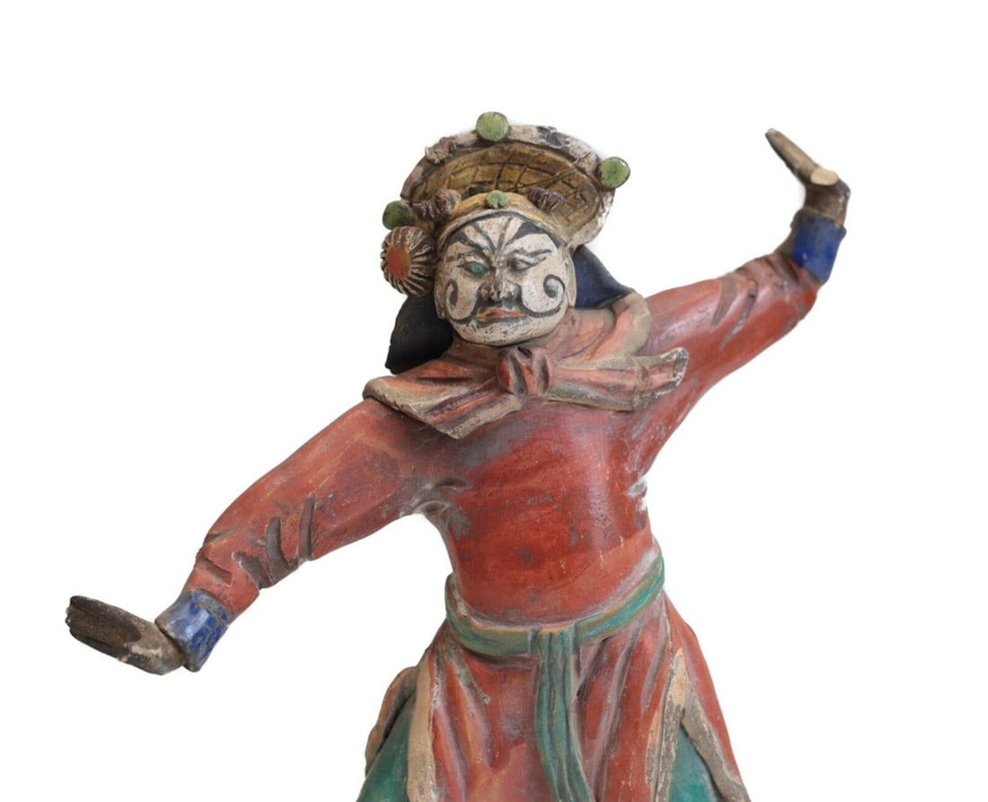 19th c Chinese Polychrome Stucco Roof Figure Character with red shirt: 19th century Chinese Polychrome Stucco Glazed Roof Figure, Character with red shirt, green trousers, white and black painted face. Yellow headdress. Arms raised. On metal and acrylic mount. 1.75lbsLbs