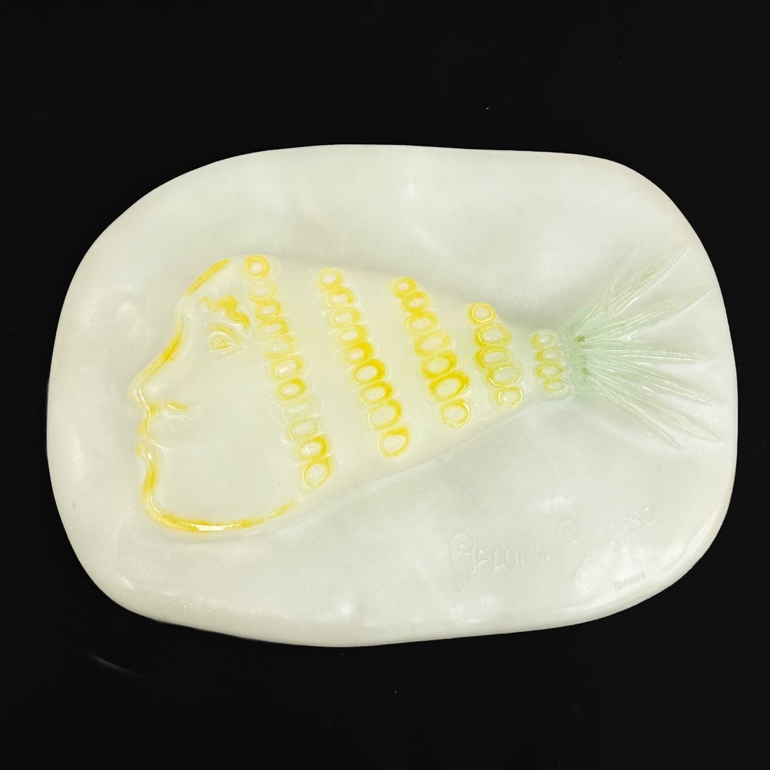 Daum Pate De Verre Art Glass Sculpture Pineapple Girl Paloma Picasso Ltd Ed/150: Daum Pate De Verre Art Glass Sculpture Plaque "Pineapple Girl" by Paloma Picasso. Opaque white to the base with yellow and green to reliefs of a figural head of a girl. Marked Paloma Picasso Daum to t