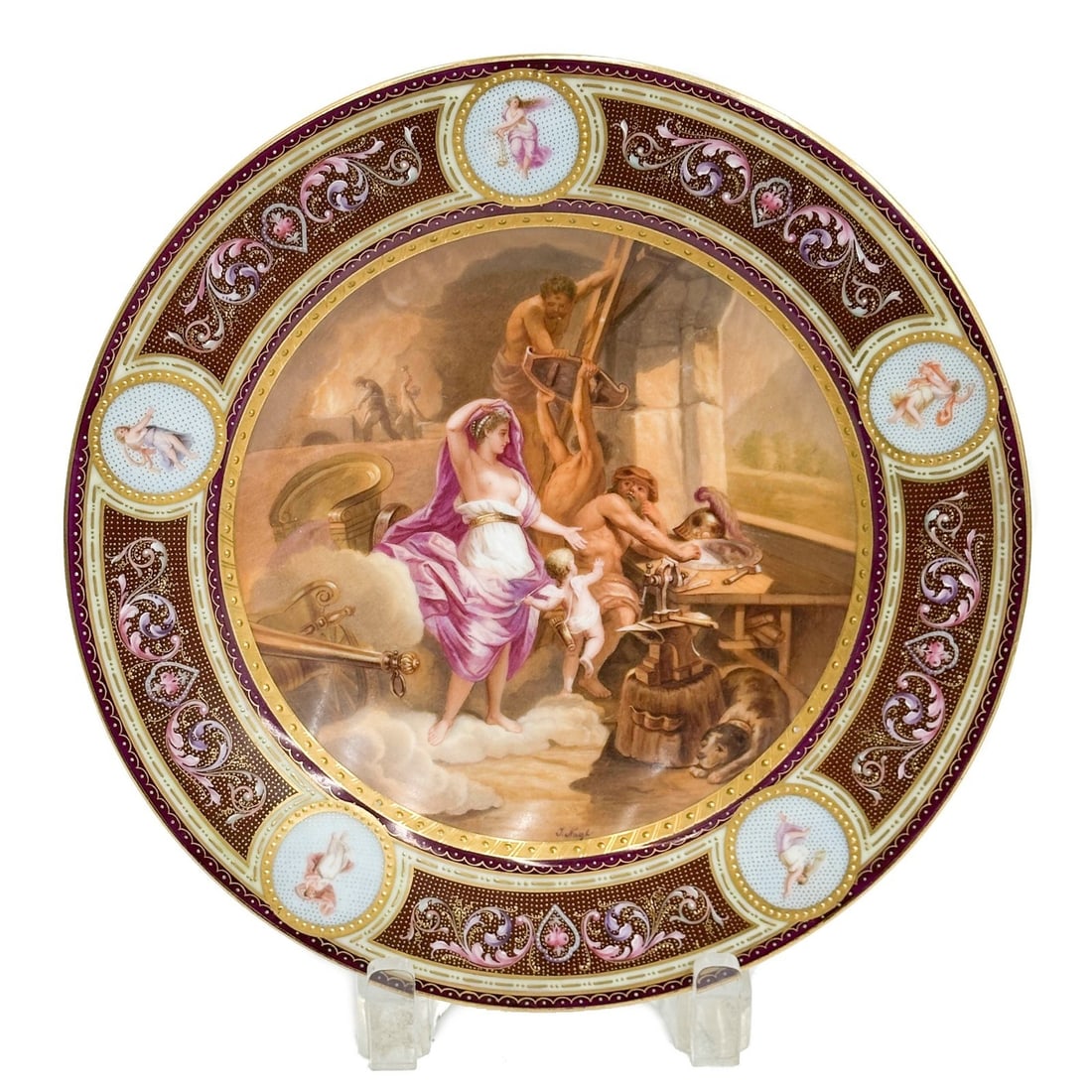 Royal Vienna Austria Hand Painted Porcelain Plate Venus Signed J Nage c1910: Royal Vienna Austria Hand Painted Porcelain Plate, circa 1910. Artist signed J Nage to the lower edge, underside titled "Venus in der Schmiede des Vulkan", Royal Vienna beehive mark. Weight: Approx. 1