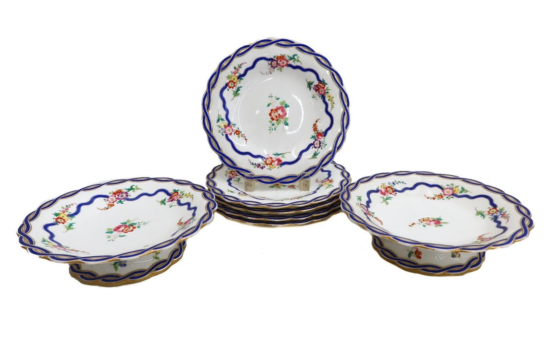 English Hand Painted Porcelain Dessert Service for 5 Pink Florals 1861: English hand painted porcelain dessert service for 5, 1861. Hand painted florals to center with blue garlands. English registration mark to underside dating to June 20, 1861. The dessert service inclu