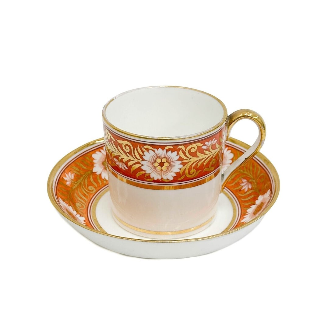 English Derby Hand Painted Cup & Saucer Gilt & Orange Florals circa 1820: English Derby Hand Painted Cup & Saucer. An orange band to the edge with florals, gilt accents. Underside with FF impressed marks Weight: Approx. .5 lbMeasurements: Approx. Cup: 3.5 inches x 2.75 inch