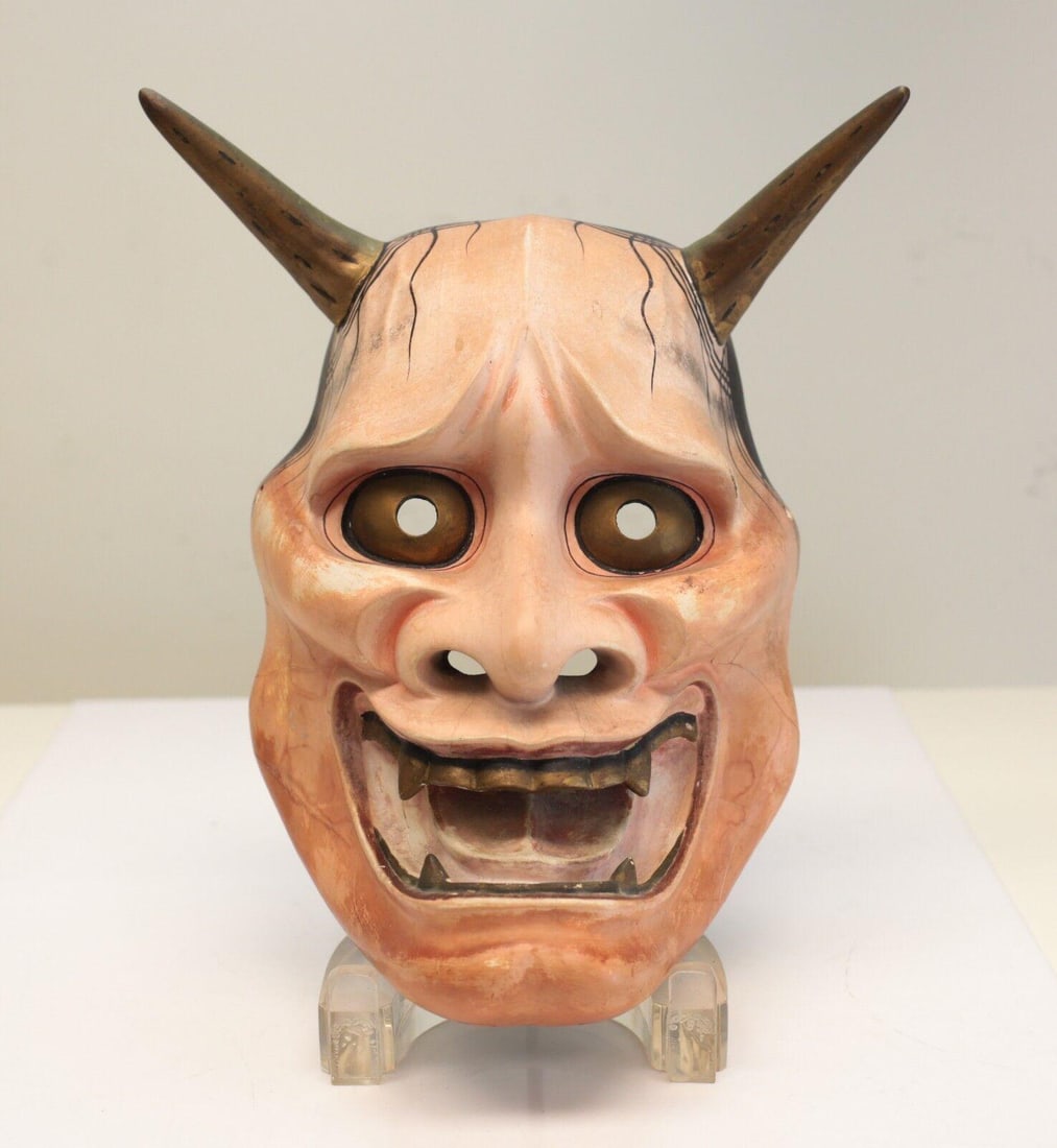 Japanese Ja / Hannya Noh Mask, Polychrome, Very fine sculpt, gold eyes: Japanese Ja / Hannya Noh Mask, Polychrome, Very fine sculpt, gold eyes, pigments on gesso. Grimacing demon / woman with bulging eyes, two horns. No ears. Older piece. 0.5lbs Measurements: Approx. 9.5"