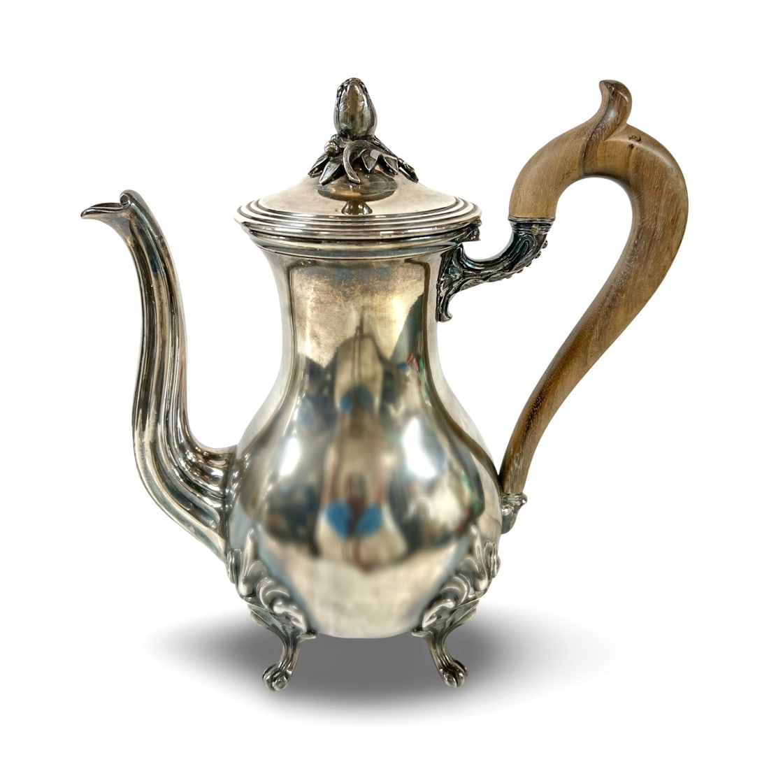 Christofle France silver plated Footed coffee pot 19th century: Antique Christofle France silver-plated Footed coffee pot 19th century, wood handle, bud finial, three scroll caw feet. 2.4lbs Measurements: Approx. to finial 9 inches height x spout to handle 8.75 in