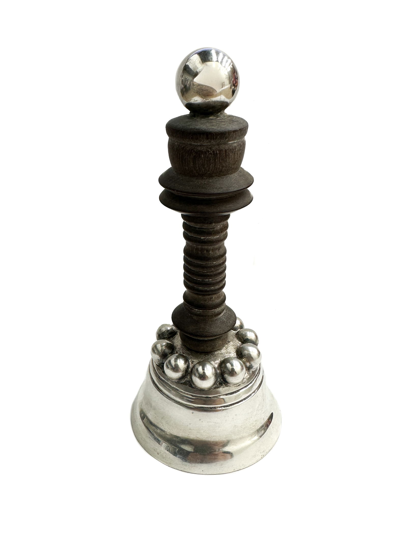 William Spratling Mexico Sterling Silver and Wooden Bell: William Spratling Mexico Sterling Silver and Wooden Bell. Beaded design to bell with a wooden handle, circa 1945. William Spratling mark to inner bell Weight Approx., 2.256 ozt Measures Approx., 2 inc