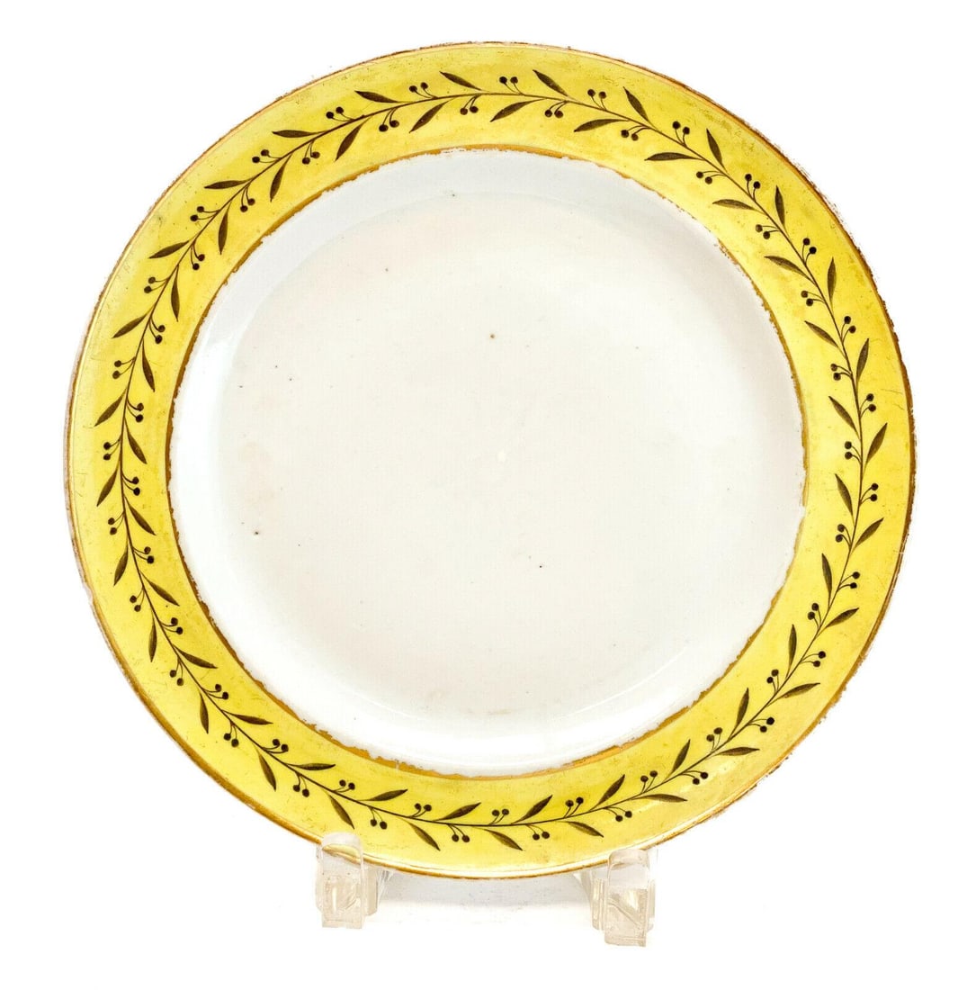 Chinese Export Porcelain 9.6 inch Cabinet Plate, 18th Century. Yellow Rim: Chinese Export porcelain 9.6 inch cabinet plate, 18th Century. A yellow rim with hand painted vines around. Weight: Approx. 1 lbs Measurements: Approx.9.6 inch diameter Condition: Chip to one side of