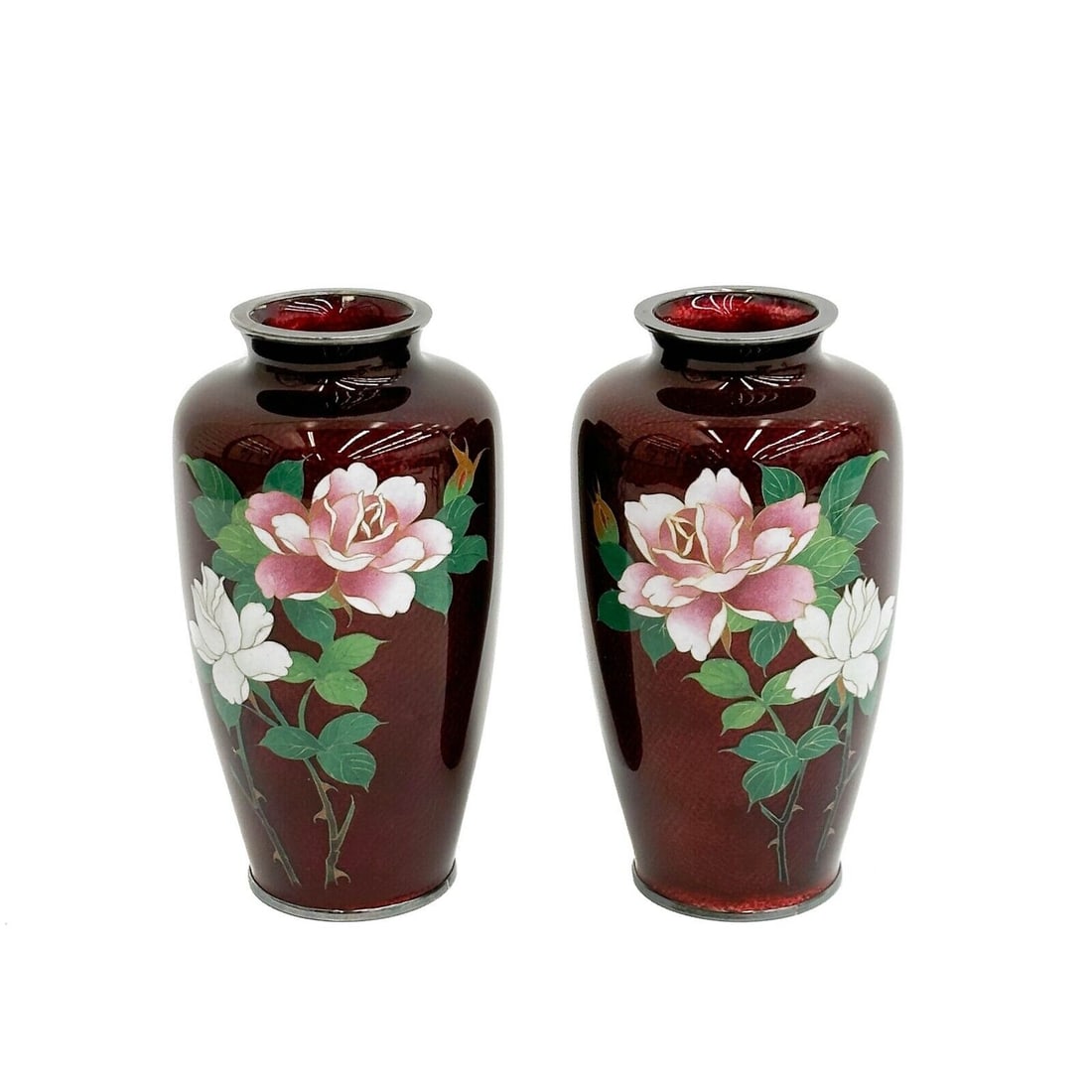 Pair Japanese Cloisonne Enamel Vases Silver Mounts Pink & White Roses c 1930: Pair Japanese Silver Mounted Cloisonne Enamel Vases, circa 1930. A textured red ground, decorated with pink and white roses. Silver mounts, underside marked Silver. Weight: Approx. 2 lbs Measurements: