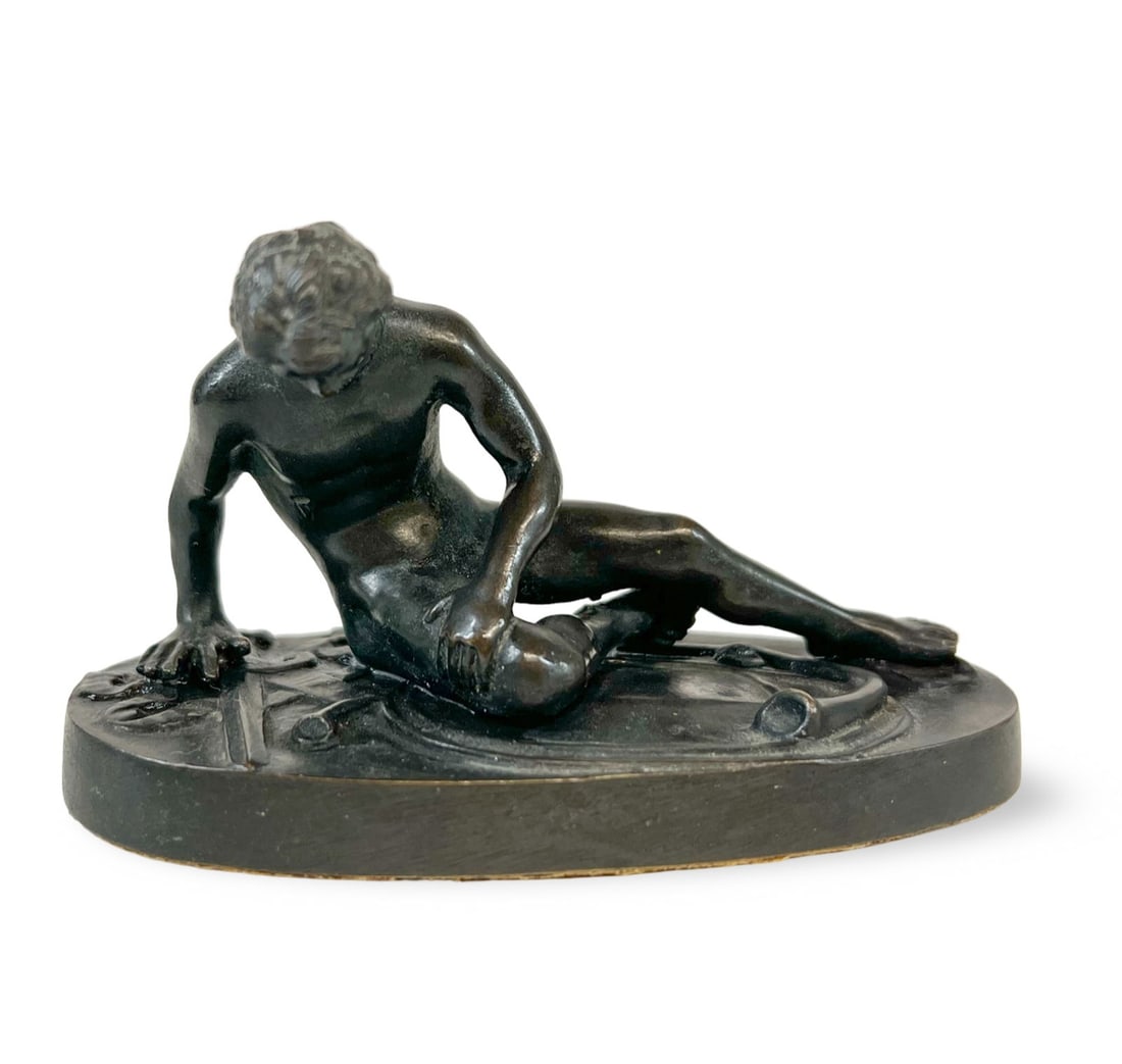 Grand Tour Miniature Cast Bronze figure after The Dying Gaul 19th Century: Grand Tour Miniature Cast Bronze figure after The Dying Gaul. The Dying Gaul, also called The Dying Galatian or The Dying Gladiator, an ancient Roman marble statue now in the Capitoline Museums in Rom