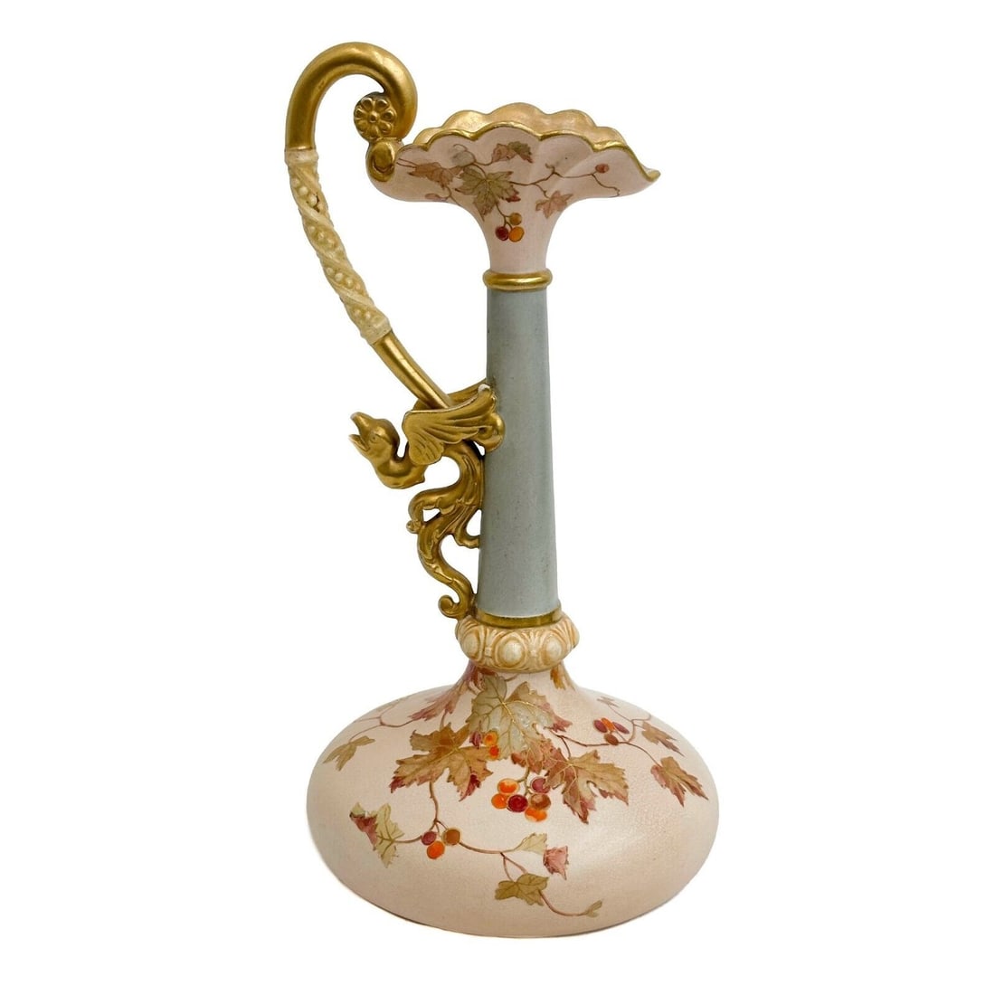 Wedgwood England Ivory Glazed Porcelain Jug 19th century: Wedgwood England Ivory Glazed Porcelain Jug, 19th century. A pink ground to the spout and body, blue to the stem. Figural gilt phoenix to the handle. Hand painted grapevines to the body. Gilt accents.