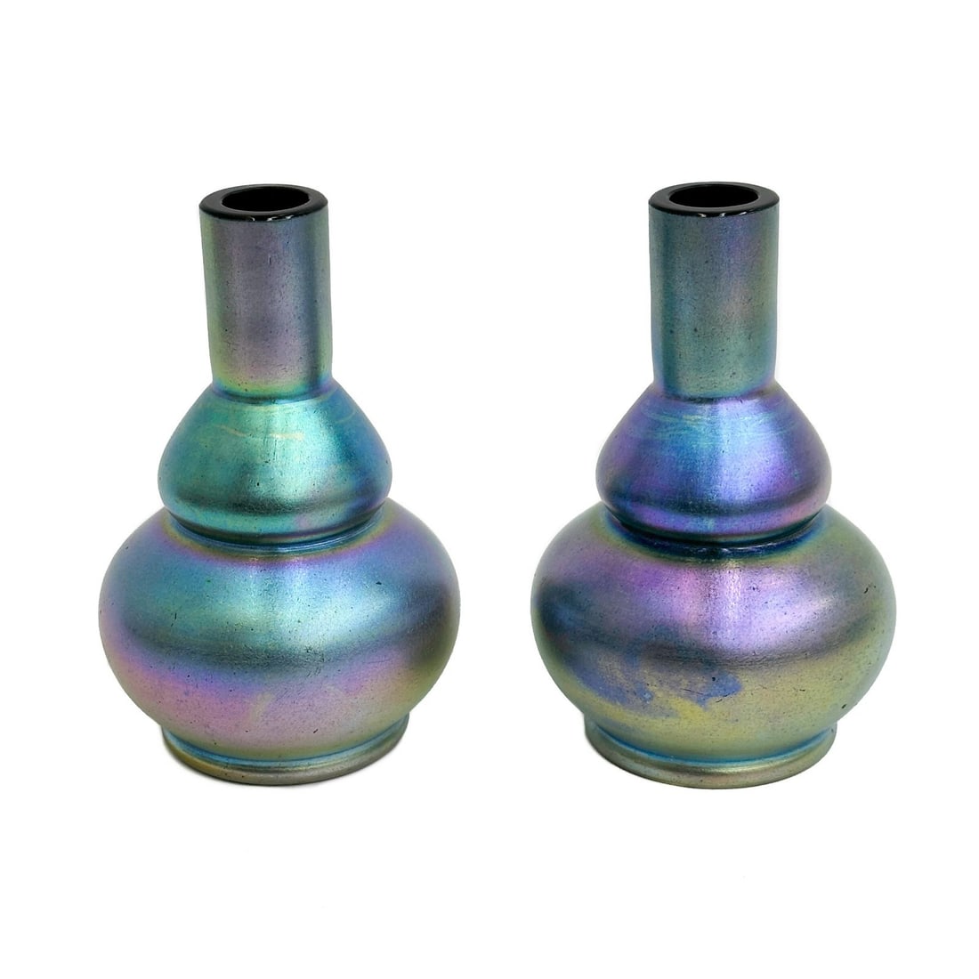 Pair Aurene Iridescent Studio Art Glass Vases 20th century: Pair Aurene Iridescent Studio Art Glass Vases, 20th century. Apparently unmarked. Weight: Approx. 2 lb Measurements: Approx. 4.5 inches diameter x 7.25 inches tall Condition: Some surface marks to fin