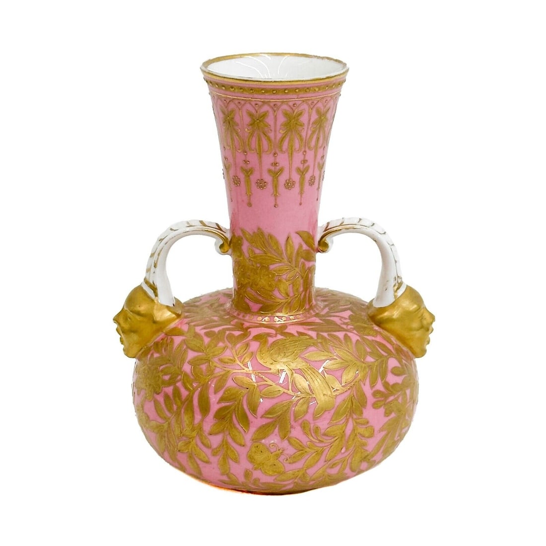 Royal Crown Derby Hand Painted Porcelain 6 inch Vase Pink circa 1890: Royal Crown Derby Hand Painted Porcelain Vase, circa 1890. A pink ground, raised gilt leaf and bird decoration. Figural faces to base of handles. Underside with Royal Crown Derby marks. Weight: Approx