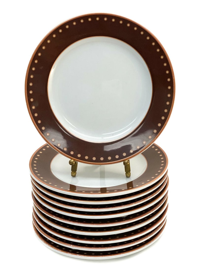 10 Bernardaud French Porcelain Bread Plates #C992: 10 Bernardaud French Porcelain Dinner Plates #C992. A brown ground to the rim with circles to the edge. Bernardaud mark to the underside base. Weight: Approx. 8 lb Measurements: Approx. 6.5 inches dia