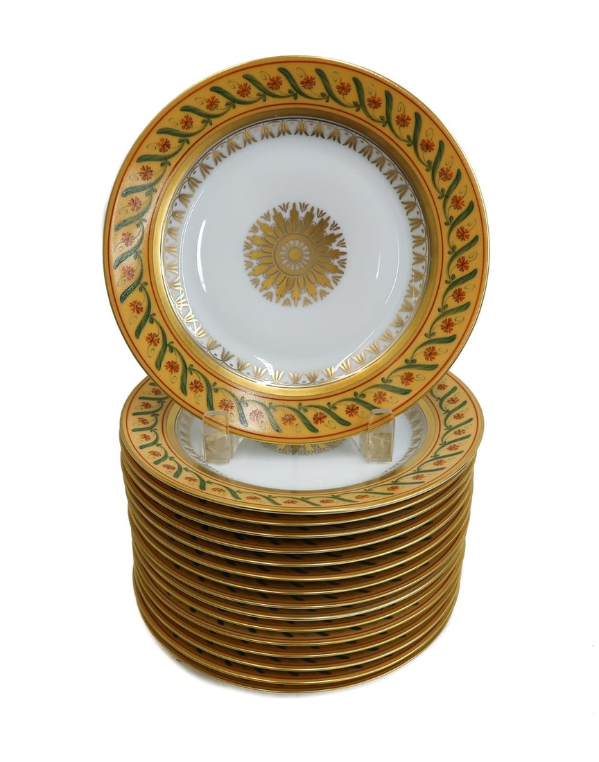16 Tiffany Le Tallec Private Stock Porcelain Dessert Plates in Directoire: 16 Tiffany Le Tallec Private Stock Dessert Plates in Directoire.A yellow ground with hand painted flowers and leaves throughout. Gilt florals to the center. Tiffany & Co. Private stock marks to the un